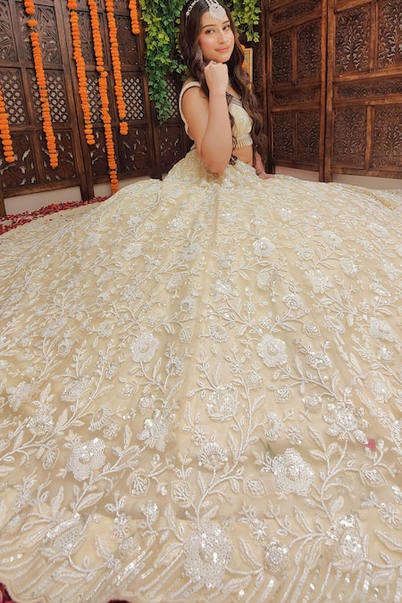 Buy Amaltas Couture Ivory Net Sequins, Metallic Thread, Resham And Moti Floral Embroidered Lehenga Set Online at Aza Fashions Buy_Amaltas Couture_Ivory Net Sequins, Metallic Thread, Resham And Moti Floral Embroidered Lehenga Set _Online_at_Aza_Fashions
