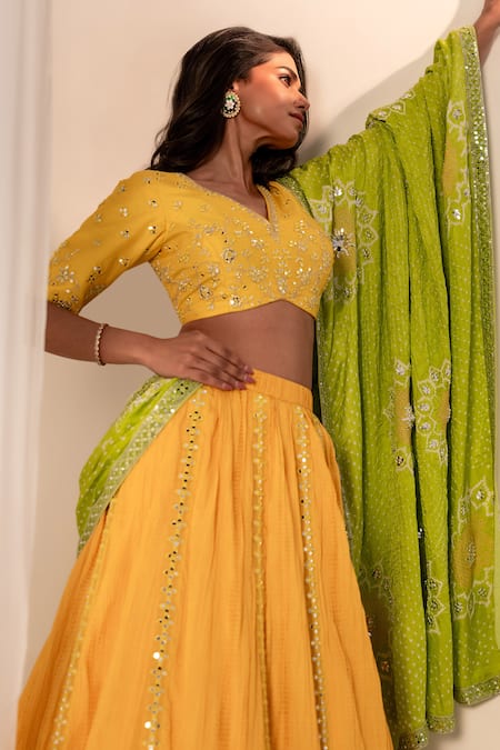 Shop_Bandhani_Yellow Silk Mirrors, Embroidery V-neck Floral Lehenga Set _Online_at_Aza_Fashions