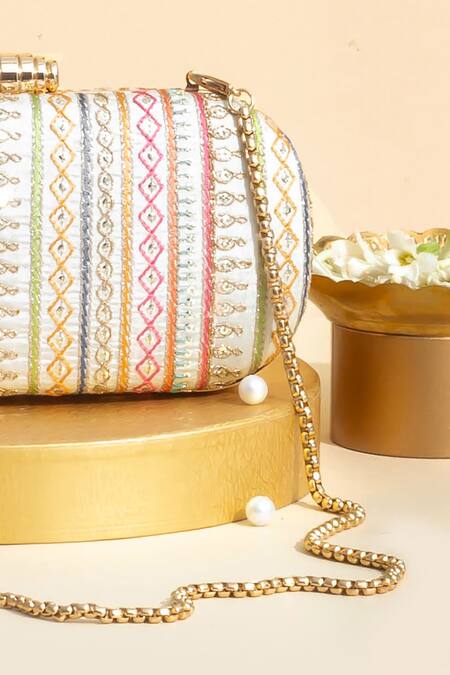 Amyra Off White Embroidery Woven Capsule Clutch Online at Aza Fashions Amyra_Off White Embroidery Woven Capsule Clutch _Online_at_Aza_Fashions