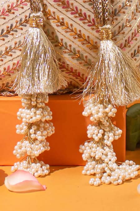 Amyra Off White Embroidery, Tassels, Pearls Chevron Potli Bag Online at Aza Fashions Amyra_Off White Embroidery, Tassels, Pearls Chevron Potli Bag _Online_at_Aza_Fashions
