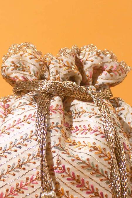 Buy Amyra Off White Embroidery, Tassels, Pearls Chevron Potli Bag Online at Aza Fashions Buy_Amyra_Off White Embroidery, Tassels, Pearls Chevron Potli Bag _Online_at_Aza_Fashions