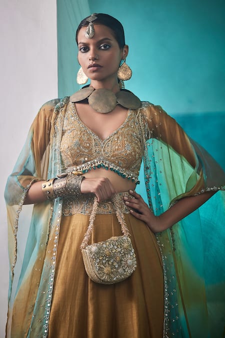 Shop Saahiil Kapoor Gold Silk, Chanderi, Organza Sequins, Hasrat Dabka Embroidered Lehenga Cape Set at Aza Fashions Shop_Saahiil Kapoor_Gold Silk, Chanderi, Organza Sequins, Hasrat Dabka Embroidered Lehenga Cape Set _at_Aza_Fashions