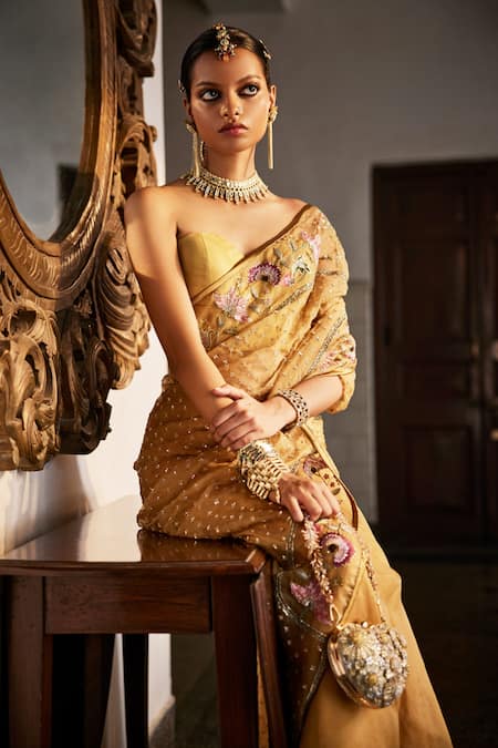 Shop Saahiil Kapoor Gold Organza, Satin Sequins, Sanobar Flower Embroidered Saree With Corset Blouse at Aza Fashions Shop_Saahiil Kapoor_Gold Organza, Satin Sequins, Sanobar Flower Embroidered Saree With Corset Blouse _at_Aza_Fashions