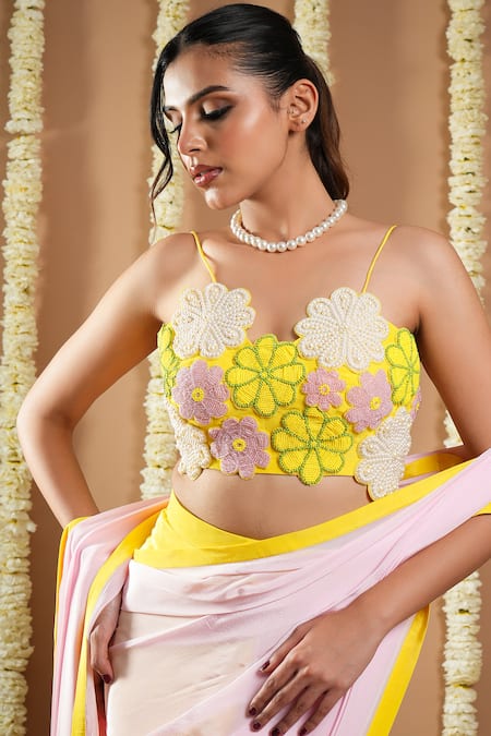Ahi Clothing Yellow Cotton, Crepe Cut Work Asymmetric Pre-draped Saree And Floral Bustier at Aza Fashions Ahi Clothing_Yellow Cotton, Crepe Cut Work Asymmetric Pre-draped Saree And Floral Bustier _at_Aza_Fashions