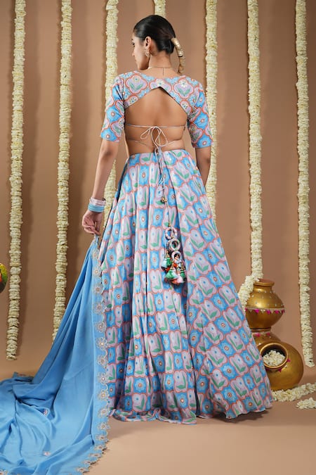 Shop Ahi Clothing Blue Georgette, Silk Cut Work, Zari, Metallic Floral Print Sky Lehenga Set at Aza Fashions Shop_Ahi Clothing_Blue Georgette, Silk Cut Work, Zari, Metallic Floral Print Sky Lehenga Set _at_Aza_Fashions