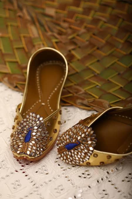 Shop 5elements Gold Mirrors, Beads Peacock Motif Juttis at Aza Fashions Shop_5elements_Gold Mirrors, Beads Peacock Motif Juttis _at_Aza_Fashions