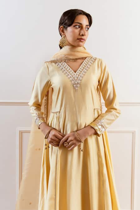Rivaaj Clothing Beige Modal, Silk Gota Patti, Sequins, Zari V-neck Embroidered Anarkali Set Online at Aza Fashions Rivaaj Clothing_Beige Modal, Silk Gota Patti, Sequins, Zari V-neck Embroidered Anarkali Set _Online_at_Aza_Fashions