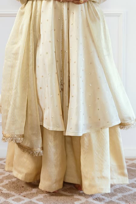 Rivaaj Clothing Ivory Silk, Tissue Sequins, Embroidery Round Neck Stripe Woven Anarkali Set at Aza Fashions Rivaaj Clothing_Ivory Silk, Tissue Sequins, Embroidery Round Neck Stripe Woven Anarkali Set_at_Aza_Fashions