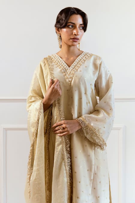 Rivaaj Clothing_Ivory Silk, Tissue Sequins, Beads, Cut Work V-neck Embroidered Kurta Set_Online_at_Aza_Fashions