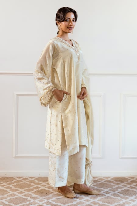 Shop_Rivaaj Clothing_Ivory Silk, Tissue Sequins, Beads, Cut Work V-neck Embroidered Kurta Set_at_Aza_Fashions