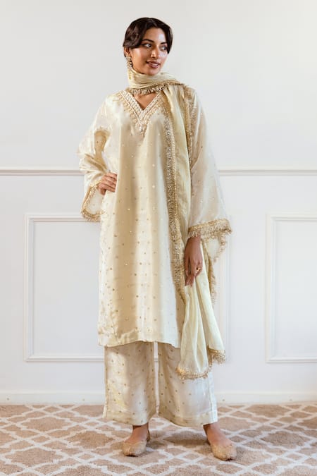 Shop_Rivaaj Clothing_Ivory Silk, Tissue Sequins, Beads, Cut Work V-neck Embroidered Kurta Set_Online_at_Aza_Fashions