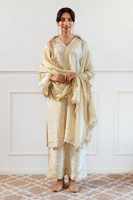 Rivaaj Clothing_Ivory Silk, Tissue Sequins, Beads, Cut Work V-neck Embroidered Kurta Set_at_Aza_Fashions