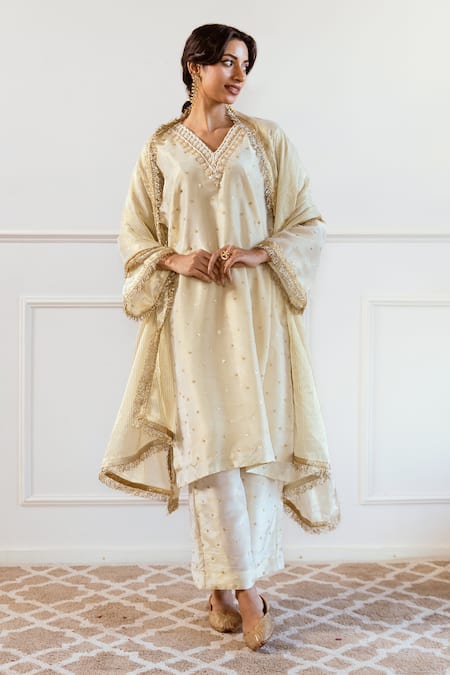 Buy_Rivaaj Clothing_Ivory Silk, Tissue Sequins, Beads, Cut Work V-neck Embroidered Kurta Set