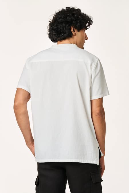 Shop Terra Luna White Cotton Pico Lite Asymmetric Hem T-shirt at Aza Fashions Shop_Terra Luna_White Cotton Pico Lite Asymmetric Hem T-shirt _at_Aza_Fashions