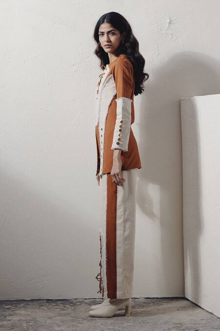 Shop Veera Wear Ivory Denim Split V-neck Lace-up Rivet Detail Top Online at Aza Fashions Shop_Veera Wear_Ivory Denim Split V-neck Lace-up Rivet Detail Top _Online_at_Aza_Fashions