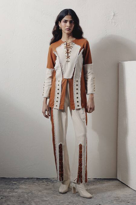 Veera Wear Ivory Denim Split V-neck Lace-up Rivet Detail Top at Aza Fashions Veera Wear_Ivory Denim Split V-neck Lace-up Rivet Detail Top _at_Aza_Fashions