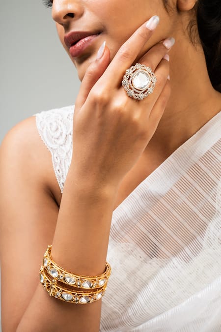 Shop Zevar King Gold Plated Stones Embellished Bangles Set Of 2 at Aza Fashions Shop_Zevar King_Gold Plated Stones Embellished Bangles Set Of 2 _at_Aza_Fashions