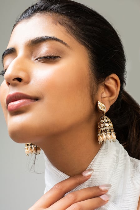 Shop Zevar King White Scallop Stone Studded Jhumkas at Aza Fashions Shop_Zevar King_White Scallop Stone Studded Jhumkas _at_Aza_Fashions