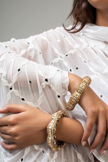 Shop Zevar King Gold Plated Stones Antique Floral Bangle With Blue at Aza Fashions Shop_Zevar King_Gold Plated Stones Antique Floral Bangle With Blue _at_Aza_Fashions