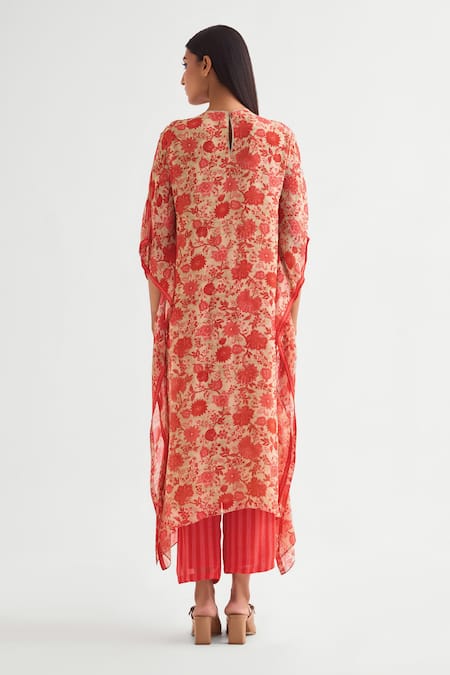 Shop Namrata Joshipura Beige Georgette Sequins Keyhole Neck Embellished Asymmetric Kaftan And Pant Set at Aza Fashions Shop_Namrata Joshipura_Beige Georgette Sequins Keyhole Neck Embellished Asymmetric Kaftan And Pant Set _at_Aza_Fashions