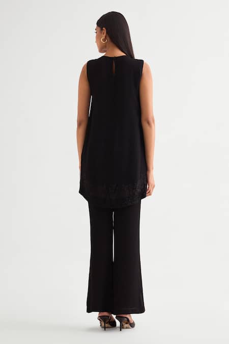 Shop Namrata Joshipura Black Georgette Applique, Beads Round Embellished High-low Top And Flared Pant at Aza Fashions Shop_Namrata Joshipura_Black Georgette Applique, Beads Round Embellished High-low Top And Flared Pant _at_Aza_Fashions