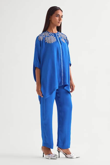 Shop Namrata Joshipura Blue Satin Sequins, Embroidery Round Neck Asymmetric Floral Tunic Set Online at Aza Fashions Shop_Namrata Joshipura_Blue Satin Sequins, Embroidery Round Neck Asymmetric Floral Tunic Set _Online_at_Aza_Fashions
