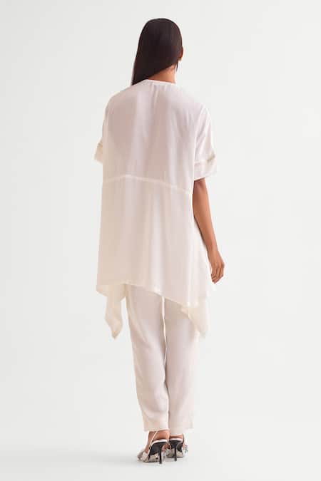 Shop_Namrata Joshipura_Ivory Satin Embroidery Round Neck Floral Asymmetric Tunic Set _at_Aza_Fashions