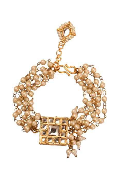 Shop Just Shradhas Gold Plated Pearls, Crystals Kundan And Embellished Bracelet at Aza Fashions Shop_Just Shradhas_Gold Plated Pearls, Crystals Kundan And Embellished Bracelet _at_Aza_Fashions