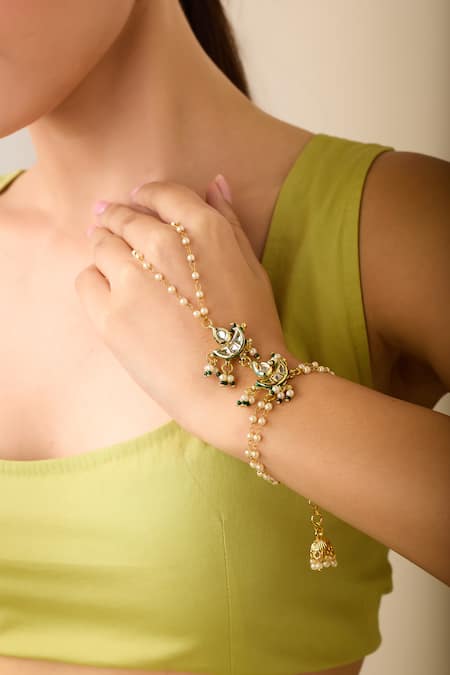 Just Shradhas Gold Plated Natural Stone And Pearl Haathphool Online at Aza Fashions Just Shradhas_Gold Plated Natural Stone And Pearl Haathphool _Online_at_Aza_Fashions