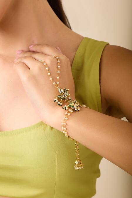 Buy Just Shradhas Gold Plated Natural Stone And Pearl Haathphool Online at Aza Fashions Buy_Just Shradhas_Gold Plated Natural Stone And Pearl Haathphool _Online_at_Aza_Fashions