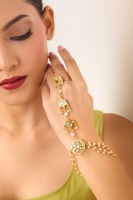 Just Shradhas Gold Plated Pearls, Stones Natural Haathphool Online at Aza Fashions Just Shradhas_Gold Plated Pearls, Stones Natural Haathphool _Online_at_Aza_Fashions