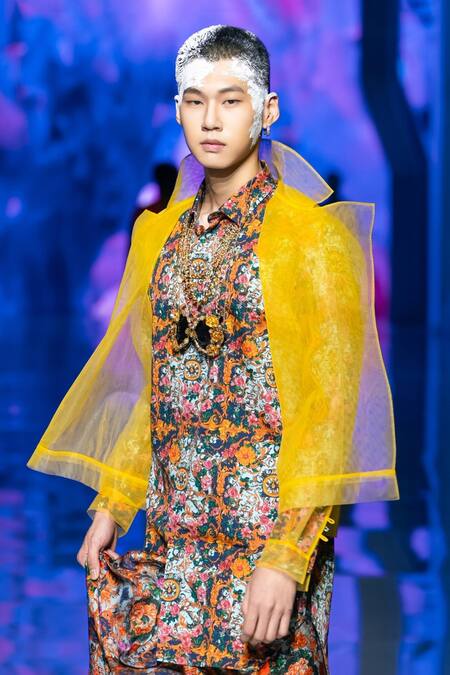 MR. Ajay Kumar_Yellow Net Racerback Ruffle Jacket _at_Aza_Fashions
