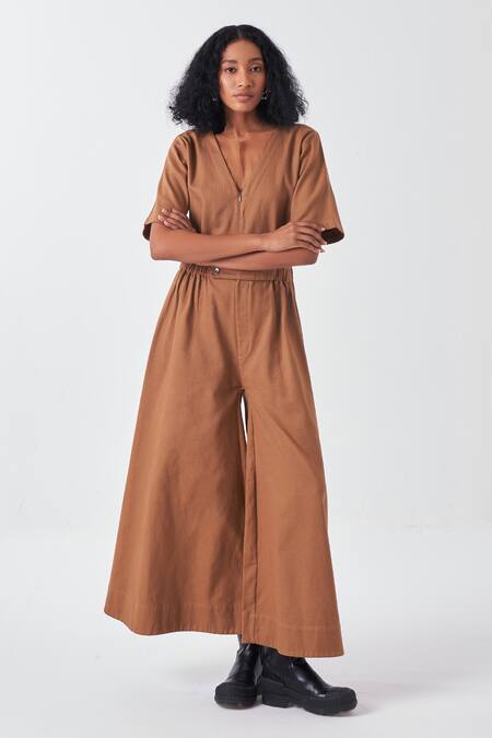 Shop Three Brown Twill V-neck Jumpsuit With Elasticated Waist Online at Aza Fashions Shop_Three_Brown Twill V-neck Jumpsuit With Elasticated Waist_Online_at_Aza_Fashions