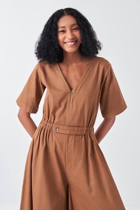 Three Brown Twill V-neck Jumpsuit With Elasticated Waist at Aza Fashions Three_Brown Twill V-neck Jumpsuit With Elasticated Waist_at_Aza_Fashions