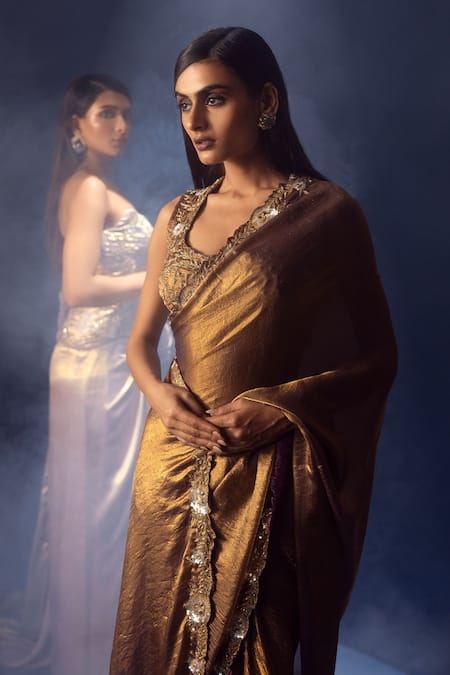 Krisha Sunny Ramani Brown Satin, Tissue Cut Work, Metallic Pre-draped Saree And Embroidered Blouse at Aza Fashions Krisha Sunny Ramani_Brown Satin, Tissue Cut Work, Metallic Pre-draped Saree And Embroidered Blouse _at_Aza_Fashions