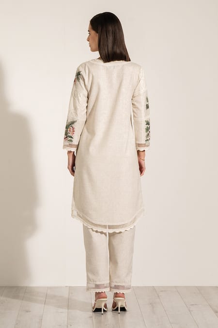 Shop RANNA GILL Beige Cotton, Linen Embroidery Asymmetric Floral Tunic And Pant Set at Aza Fashions Shop_RANNA GILL_Beige Cotton, Linen Embroidery Asymmetric Floral Tunic And Pant Set_at_Aza_Fashions