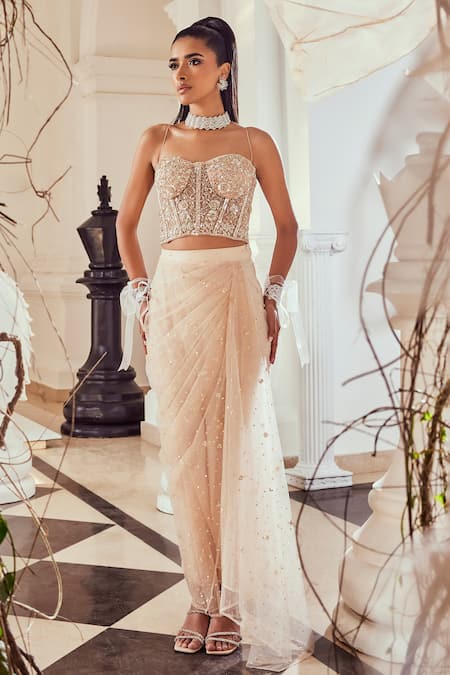 Shop_Swish By Dolcy And Simran_Pink Net Sequins, Cut Work Sweetheart Embroidered Corset Blouse And Draped Skirt _Online_at_Aza_Fashions