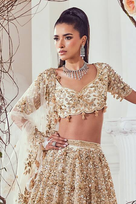 Shop_Swish By Dolcy And Simran_Ivory Net Cut Work, Sequins Sweetheart Neck Embroidered Bridal Lehenga Set _Online_at_Aza_Fashions