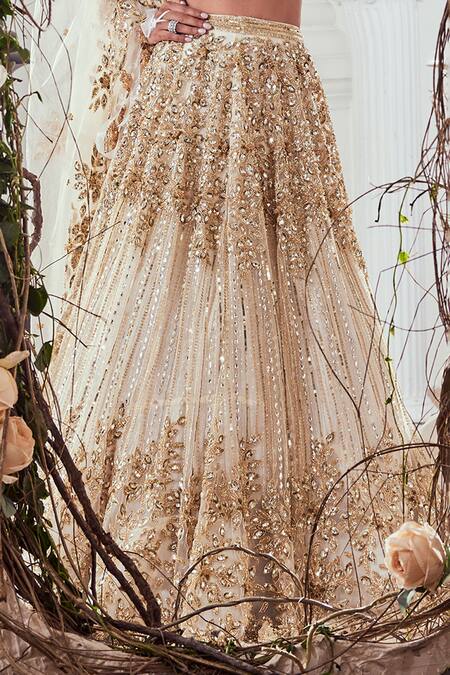 Swish By Dolcy And Simran_Ivory Net Cut Work, Sequins Sweetheart Neck Embroidered Bridal Lehenga Set _at_Aza_Fashions