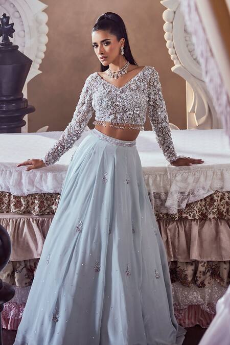 Swish By Dolcy And Simran_Silver Net, Crepe Pearls, Sequins, Cut Work Crest Embroidered Blue Lehenga Set _Online_at_Aza_Fashions