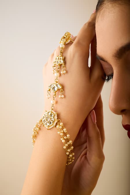 Shop Just Shradhas Gold Plated Pearls, Stones Natural Haathphool Online at Aza Fashions Shop_Just Shradhas_Gold Plated Pearls, Stones Natural Haathphool _Online_at_Aza_Fashions