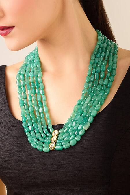 Just Shradhas Gold Plated And Green Natural Stone Long Necklace at Aza Fashions Just Shradhas_Gold Plated And Green Natural Stone Long Necklace _at_Aza_Fashions