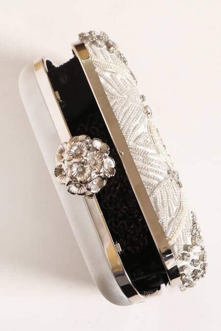Be Chic_Ivory Crystals, Cut Work, Pearls Embellished Clutch_at_Aza_Fashions