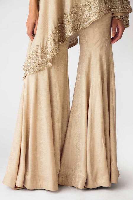 Basanti - Kapde Aur Koffee_Gold Georgette Pearls, Sequins, Cut Work Asymmetric Embroidered Cape Sharara Set_at_Aza_Fashions