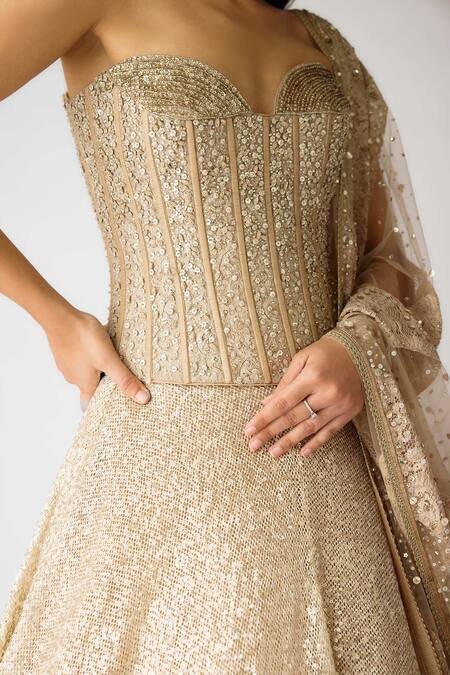 Shop Basanti - Kapde Aur Koffee Gold Net Pearls, Sequins, Stones Swarovski Embellished Corset Lehenga Set Online at Aza Fashions Shop_Basanti - Kapde Aur Koffee_Gold Net Pearls, Sequins, Stones Swarovski Embellished Corset Lehenga Set_Online_at_Aza_Fashions