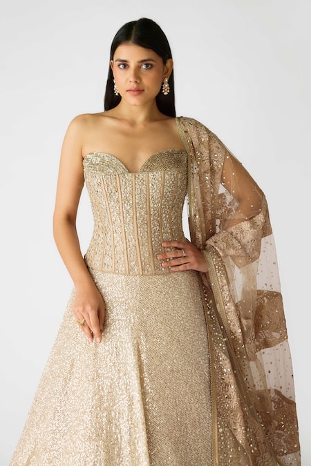 Basanti - Kapde Aur Koffee Gold Net Pearls, Sequins, Stones Swarovski Embellished Corset Lehenga Set at Aza Fashions Basanti - Kapde Aur Koffee_Gold Net Pearls, Sequins, Stones Swarovski Embellished Corset Lehenga Set_at_Aza_Fashions