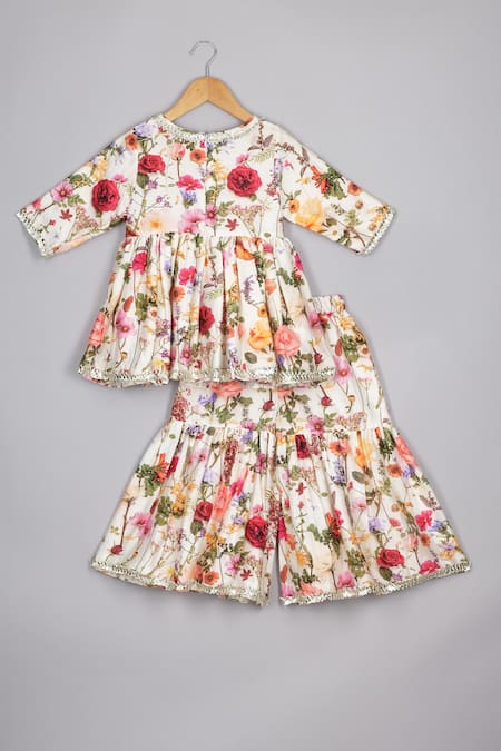 Shop P & S CO Cream Chanderi, Linen Gota Patti Floral Spring Peplum Kurta Set at Aza Fashions Shop_P & S CO_Cream Chanderi, Linen Gota Patti Floral Spring Peplum Kurta Set _at_Aza_Fashions