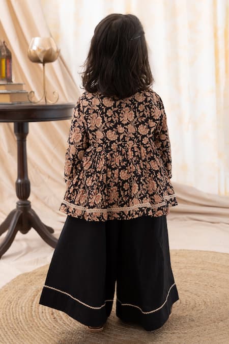 Shop Tiber Taber Black Cotton Floral Print Top And Culottes Set at Aza Fashions Shop_Tiber Taber_Black Cotton Floral Print Top And Culottes Set _at_Aza_Fashions