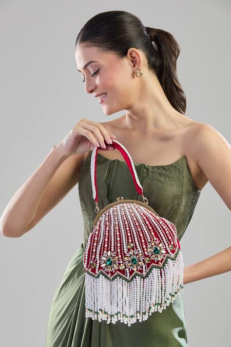 Shop Nazaakat By Samara Singh Red Pearls, Rhinestones And Potli Clutch Online at Aza Fashions Shop_Nazaakat By Samara Singh_Red Pearls, Rhinestones And Potli Clutch_Online_at_Aza_Fashions
