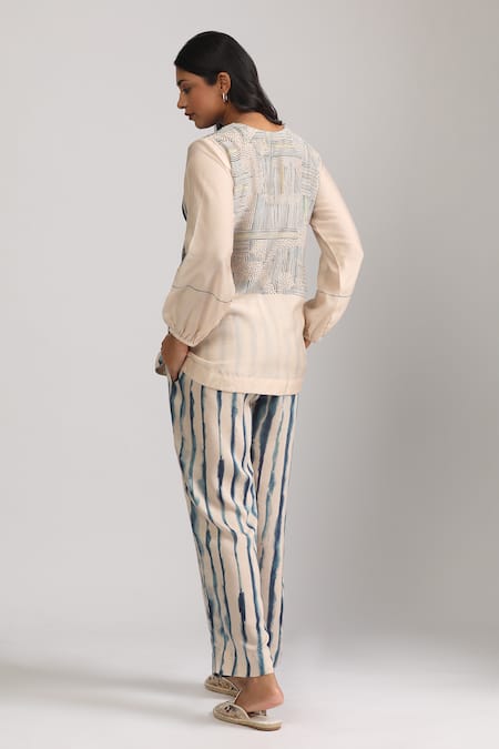Shop Trendy Tokari Beige Cotton, Silk V-neck Geometric Printed Wrap Top And Pant Set at Aza Fashions Shop_Trendy Tokari_Beige Cotton, Silk V-neck Geometric Printed Wrap Top And Pant Set _at_Aza_Fashions